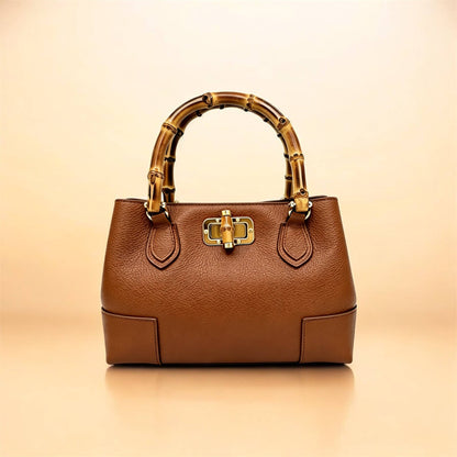 Medium Ginevra bamboo-handle leather bag in Cognac on a warm backdrop