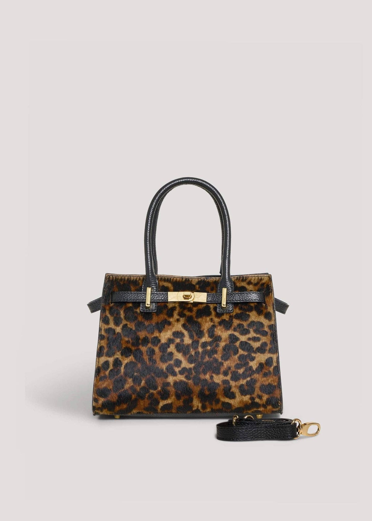 Leonora leopard calf hair top-handle bag shown with its detachable, adjustable leather shoulder strap