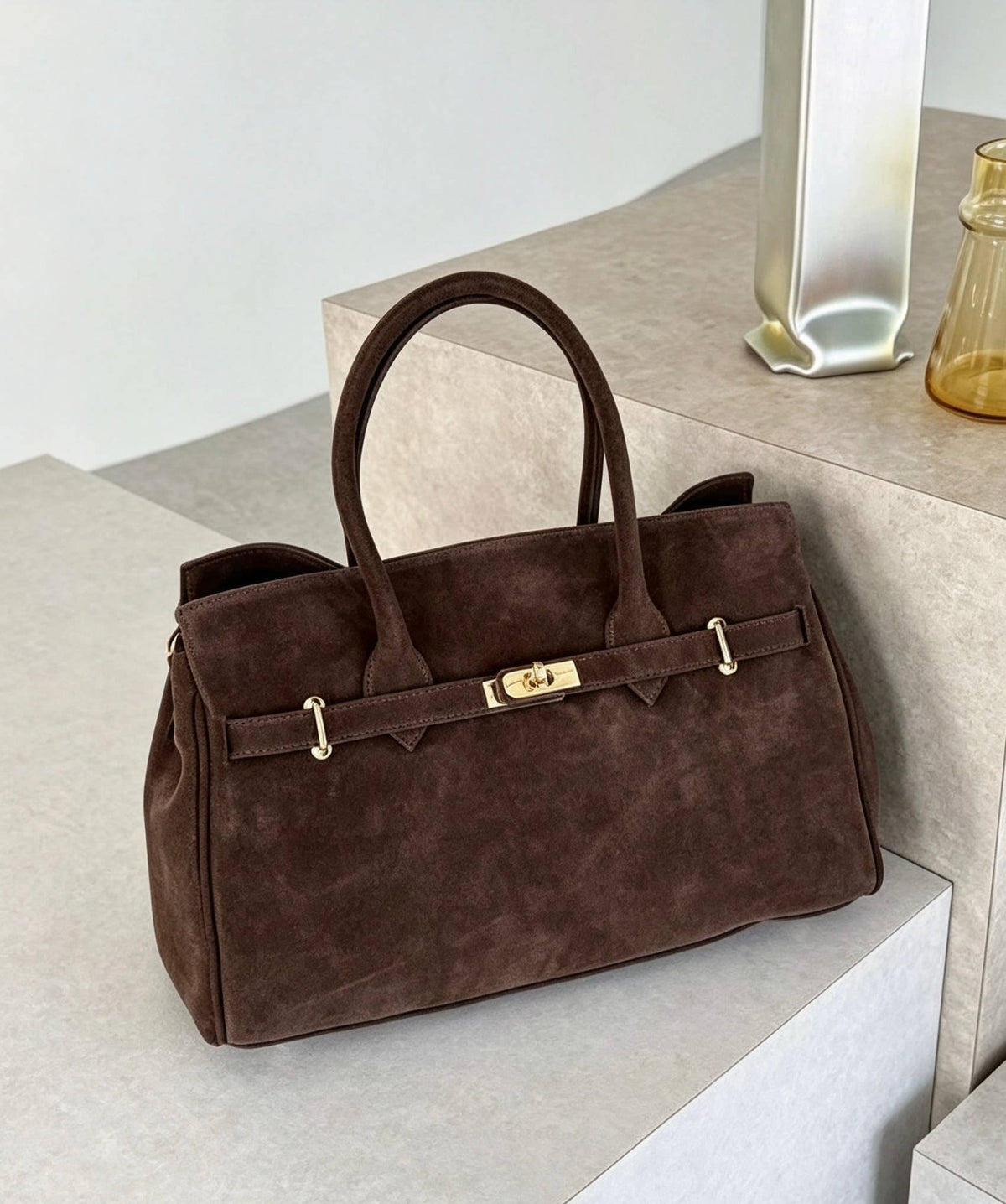 Zoe Suede Tote by Clemés - Dark Brown - styled still life
