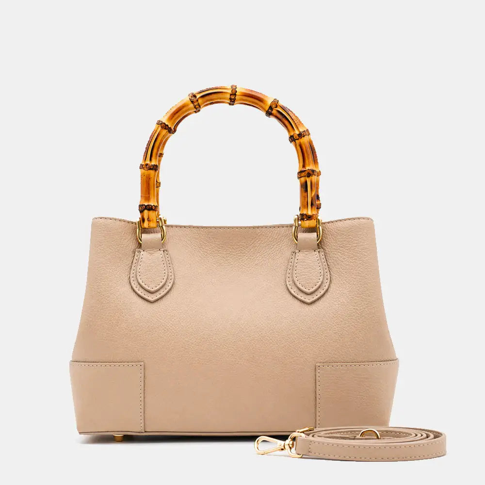 Medium Ginevra bag shown with its adjustable genuine leather shoulder strap