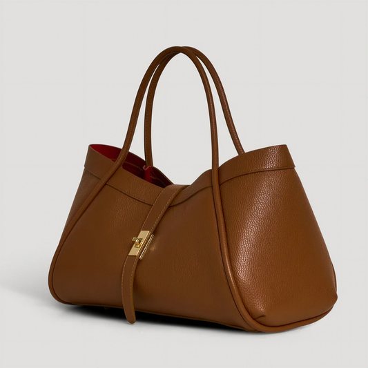 Bianca Large Leather Handbag by Clemés in Dark Tan, three-quarter studio shot on grey background