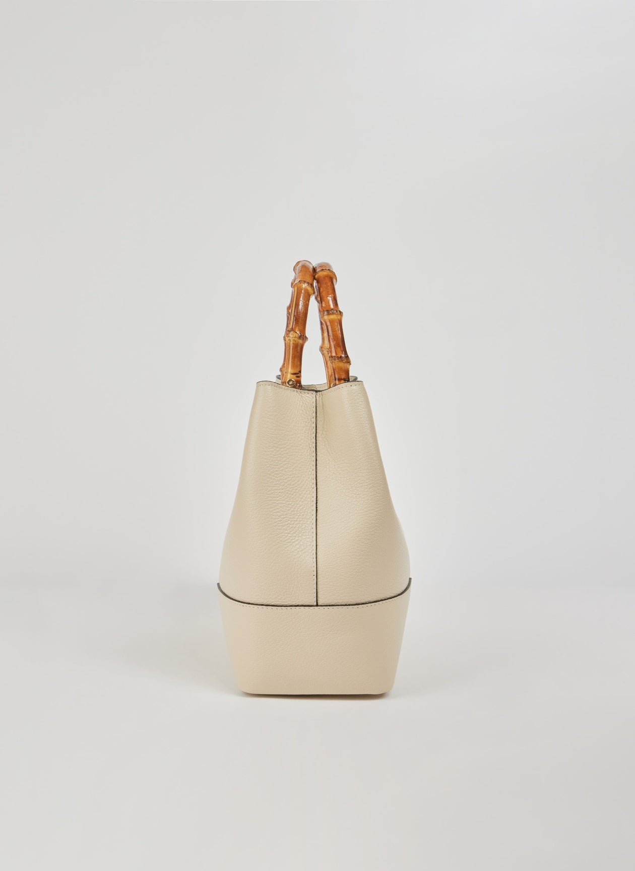 Ginevra Bamboo-Handle Leather Bag by Clemés in White, bucket bag studio shot