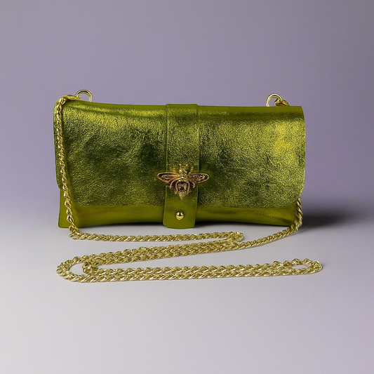 Anima Suede Leather Metallic Clutch Shoulder Bag by Clemés in Olive, three-quarter studio shot on grey background