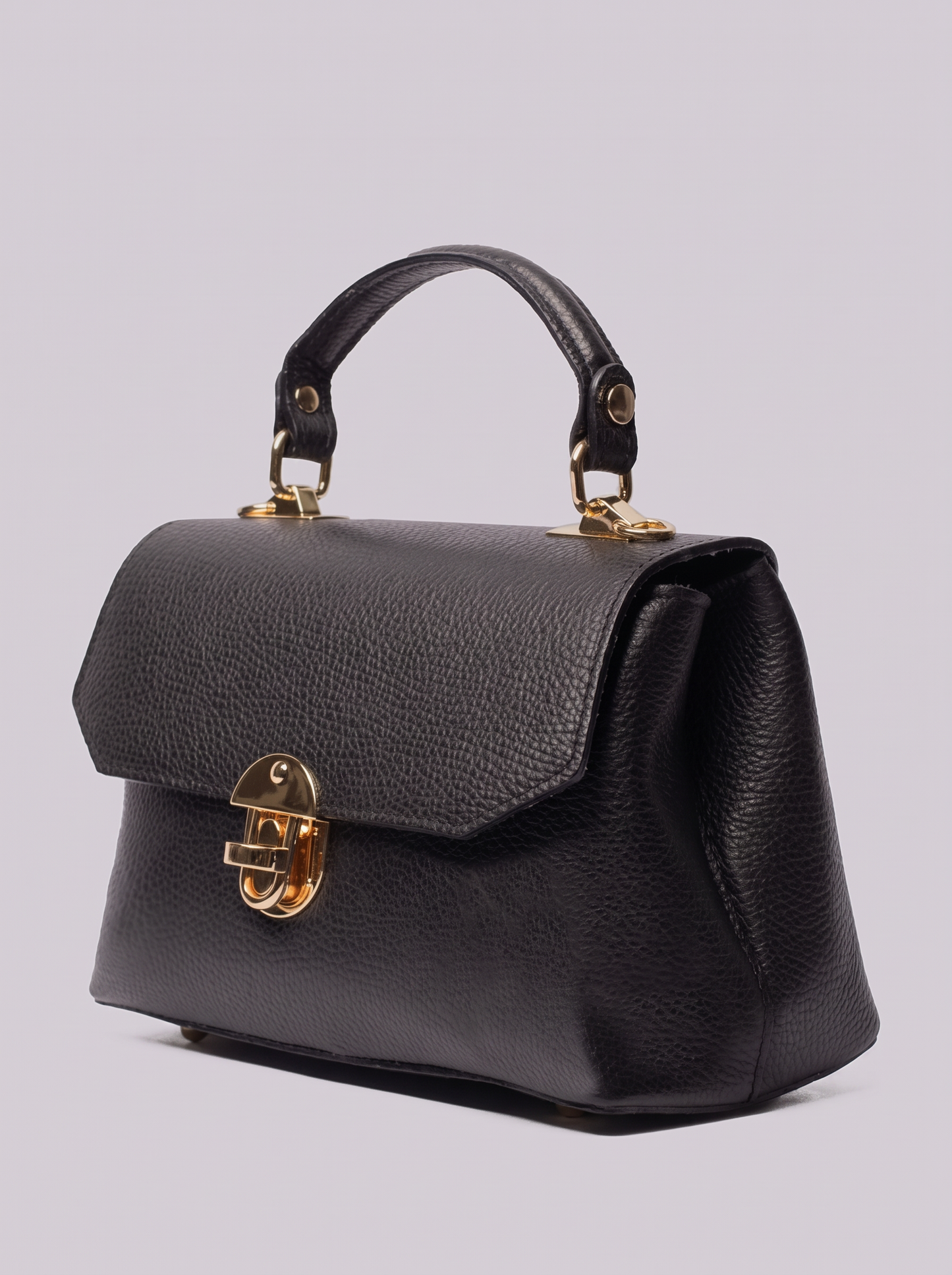 Clemés Lola Dollaro crossbody bag in Black leather, three-quarter view