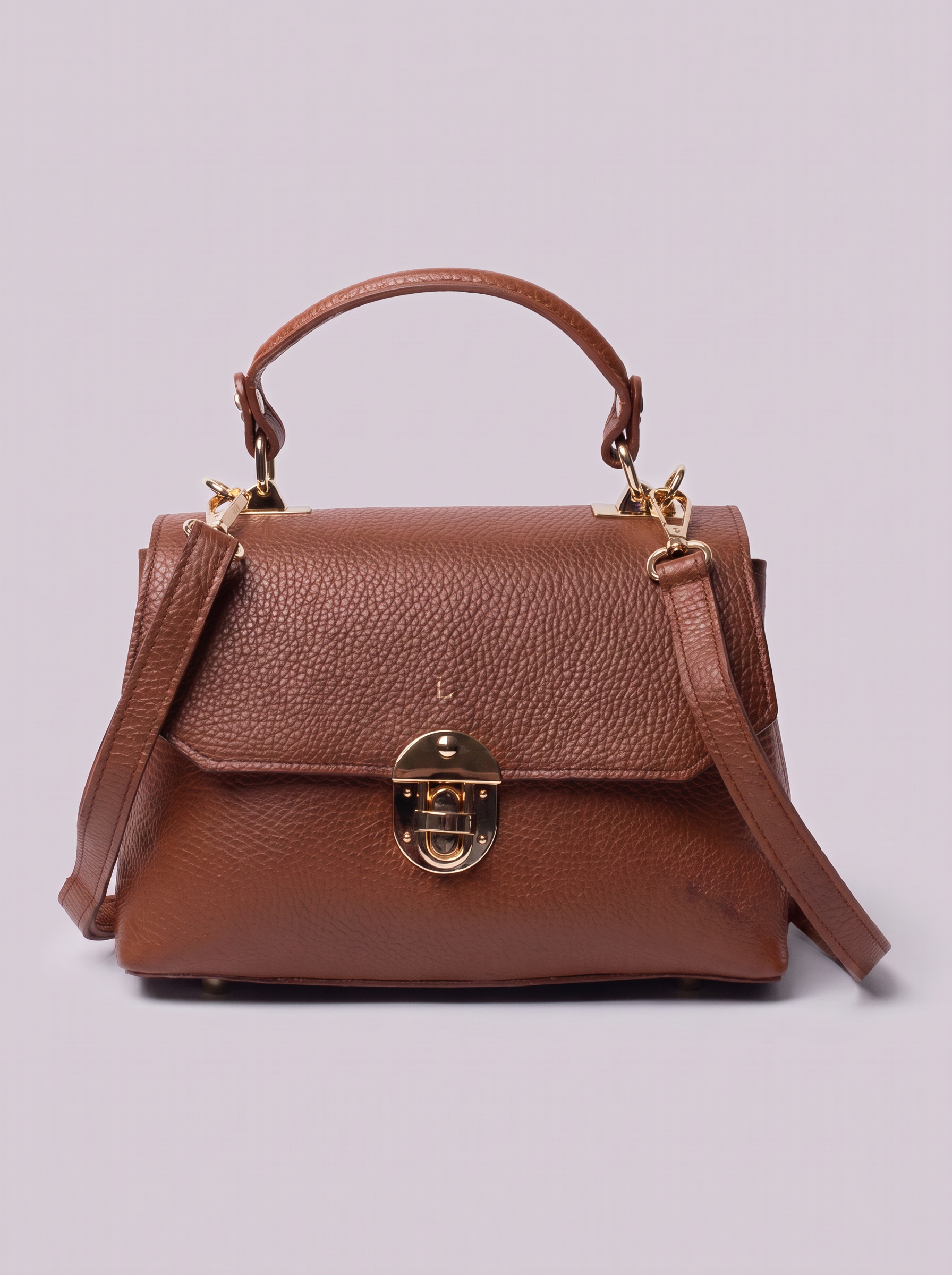 Clemés Lola Dollaro crossbody bag in Cognac leather, front view