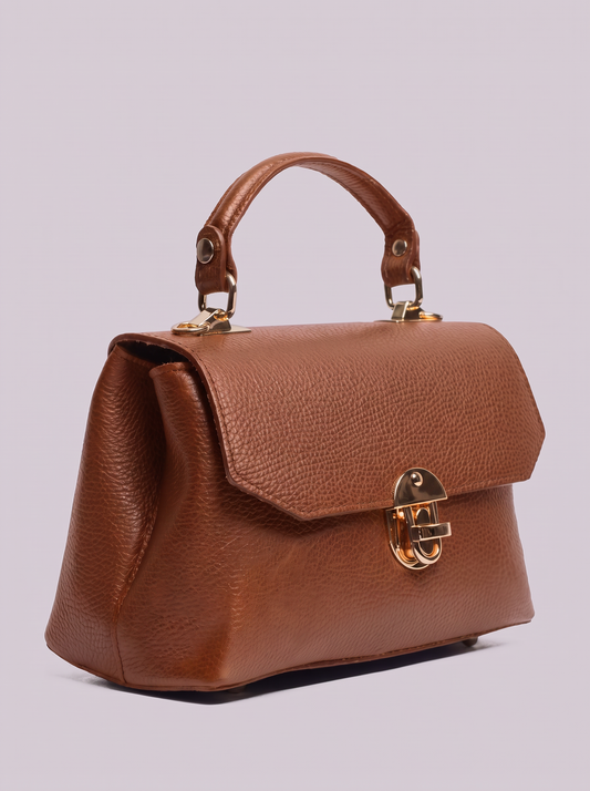 Clemés Lola Dollaro crossbody bag in Cognac leather, three-quarter view