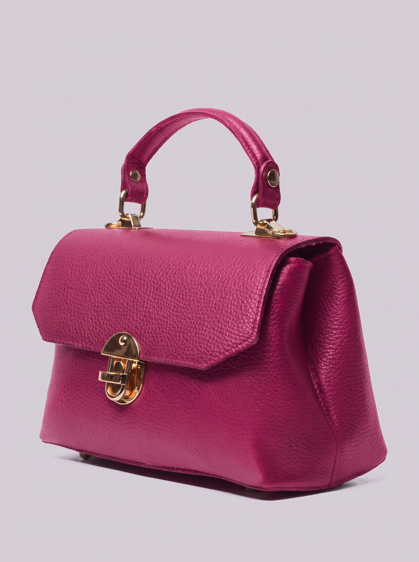 Clemés Lola Dollaro crossbody bag in Fuchsia leather, three-quarter view