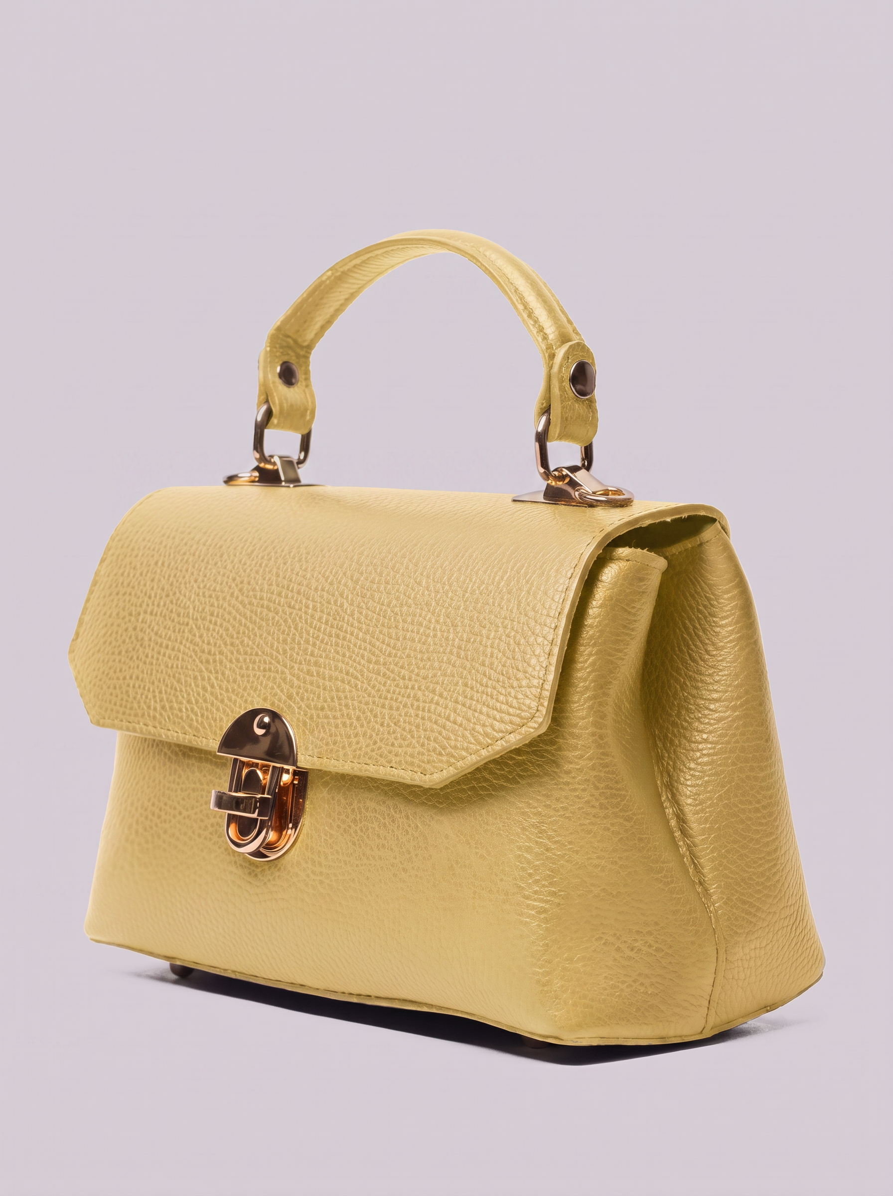 Clemés Lola Dollaro crossbody bag in Lemon leather, three-quarter view