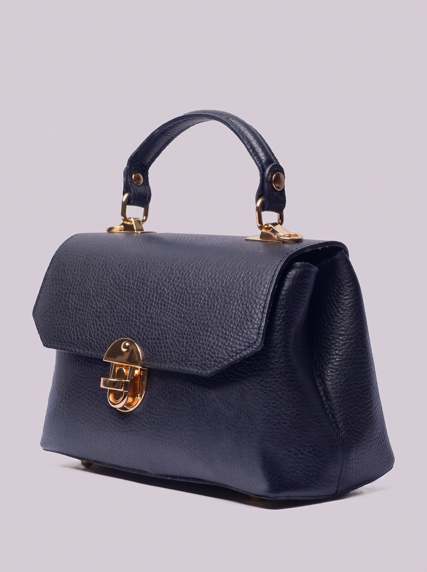 Clemés Lola Dollaro crossbody bag in Navy Blue leather, three-quarter view