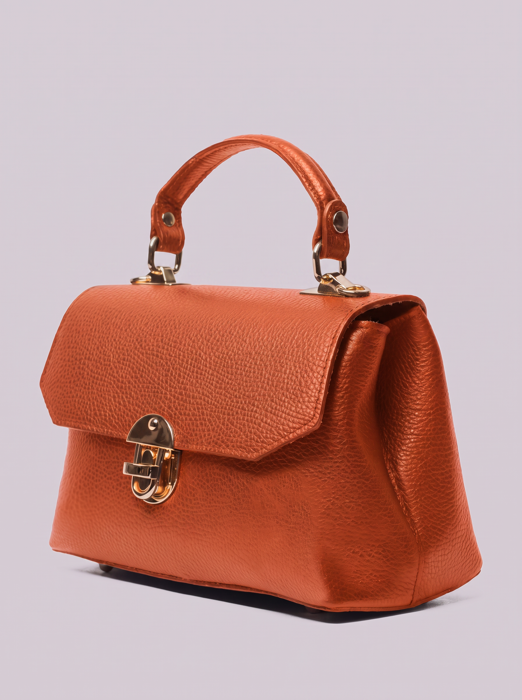 Clemés Lola Dollaro crossbody bag in Orange leather, three-quarter view