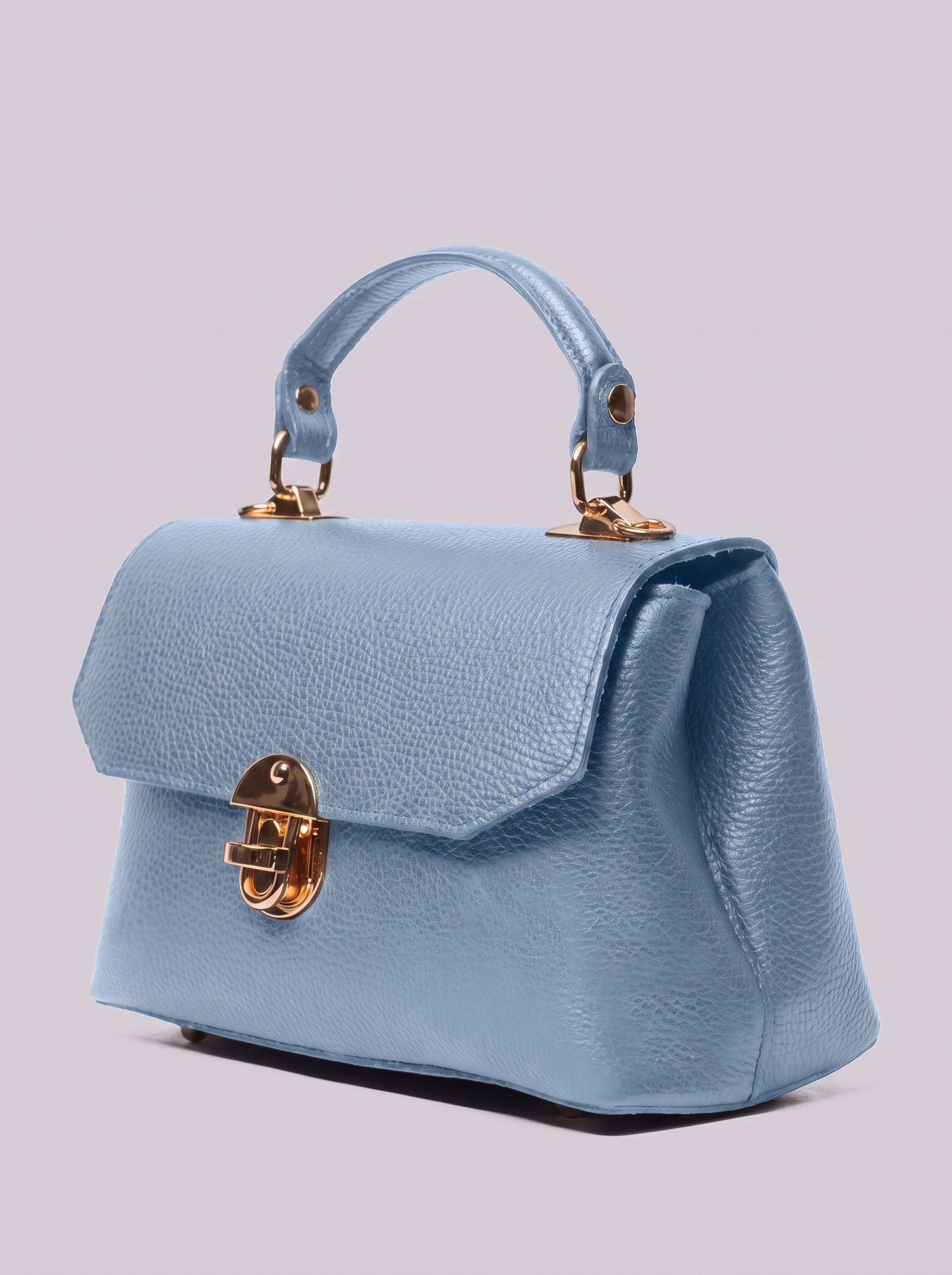 Clemés Lola Dollaro crossbody bag in Sky Blue leather, three-quarter view