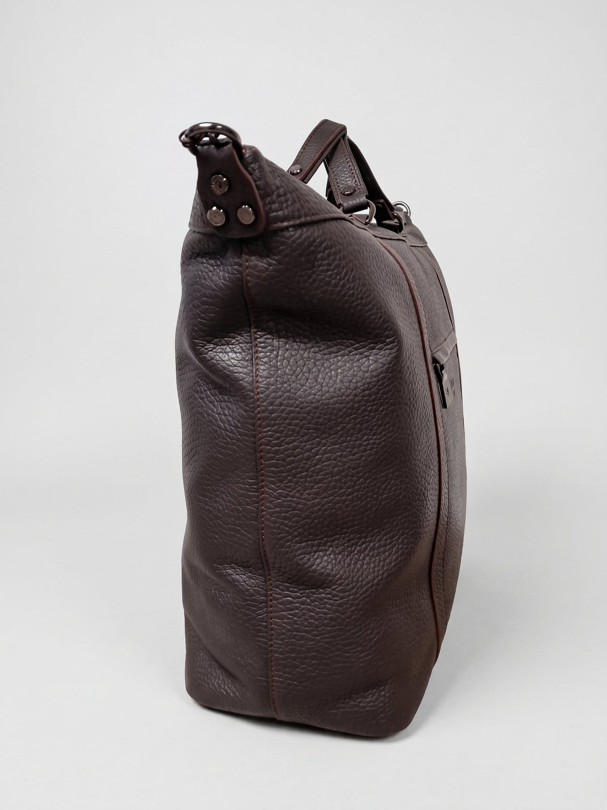 Alessio dark brown leather travel bag by Clemés, side view
