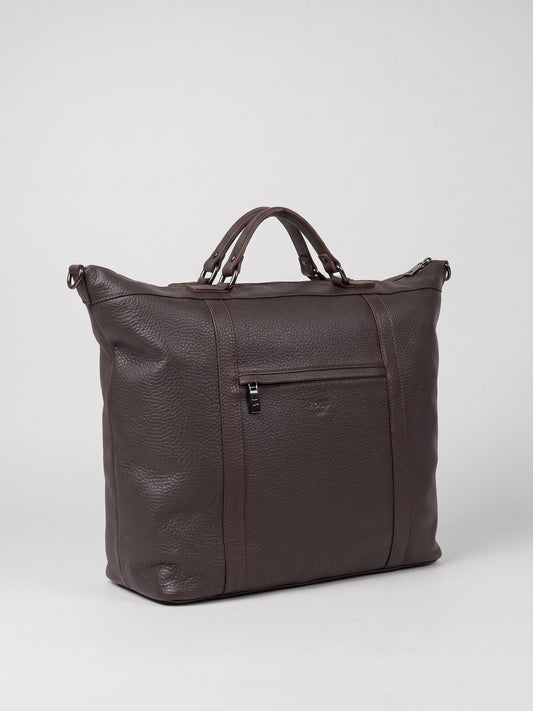 Alessio dark brown leather travel bag by Clemés, three-quarter view showing the large holdall shape
