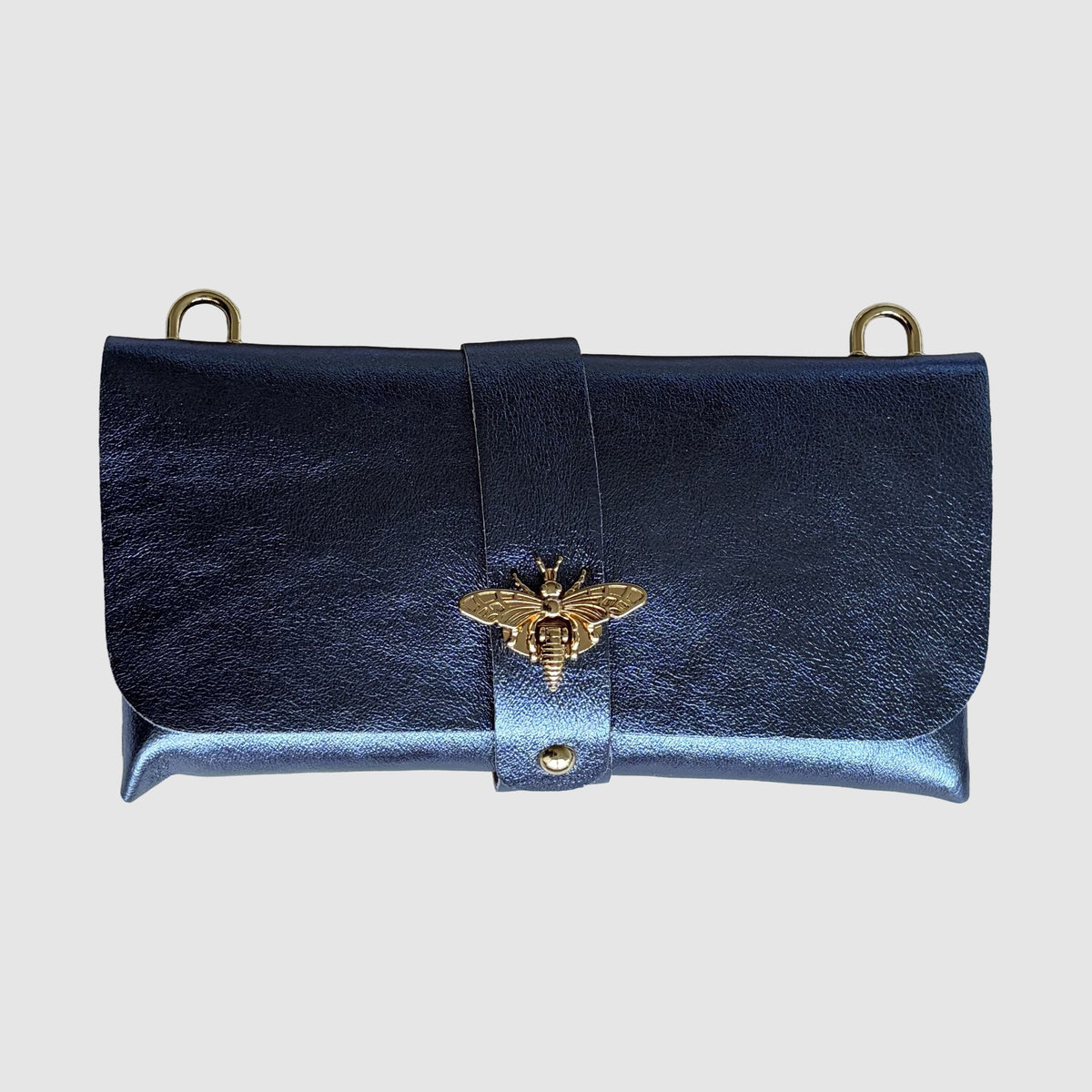 Anima Suede Leather Metallic Clutch Shoulder Bag by Clemés in Navy, close-up of the metallic suede nap and gold bee clasp