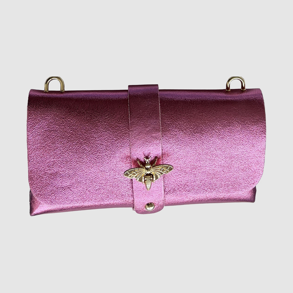 Anima Suede Leather Metallic Clutch Shoulder Bag by Clemés in Rose, close-up of the metallic suede nap and gold bee clasp