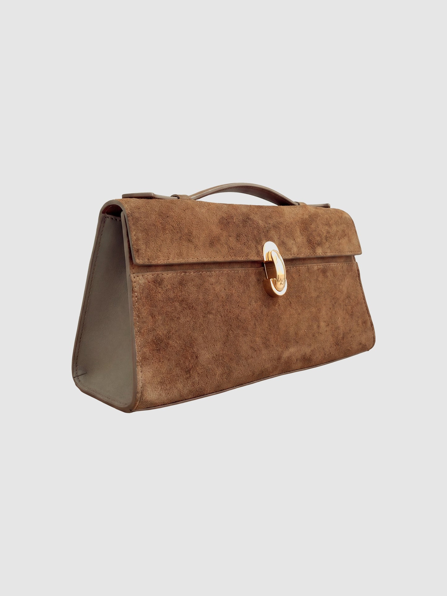 Tan Aurélie Suede Leather Baguette Bag by Clemés, three-quarter view showing the front panel and smooth leather side gusset