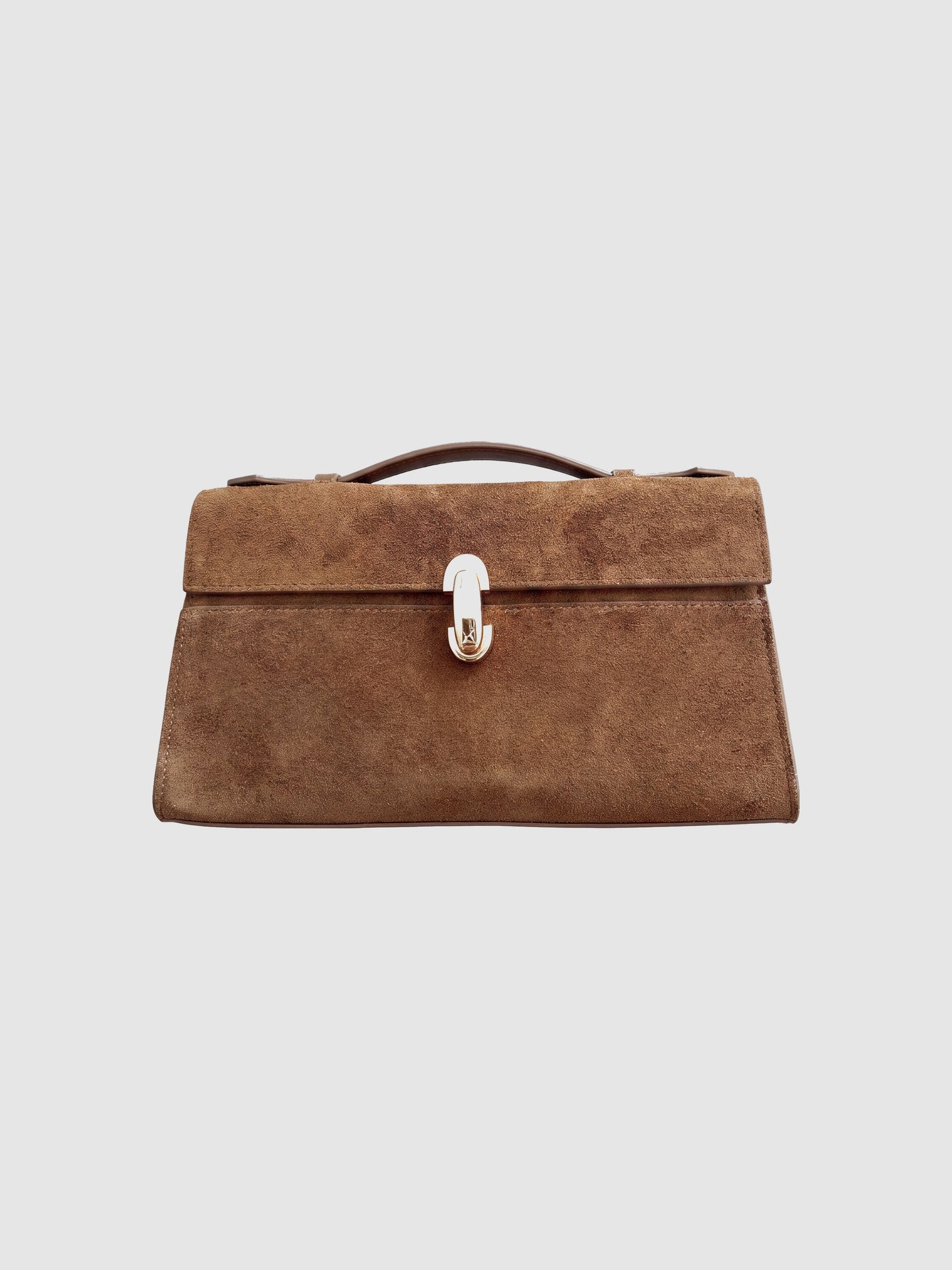 Tan Aurélie Suede Leather Baguette Bag by Clemés, front view with rust suede body, contrast smooth leather trim and gold turn-lock clasp
