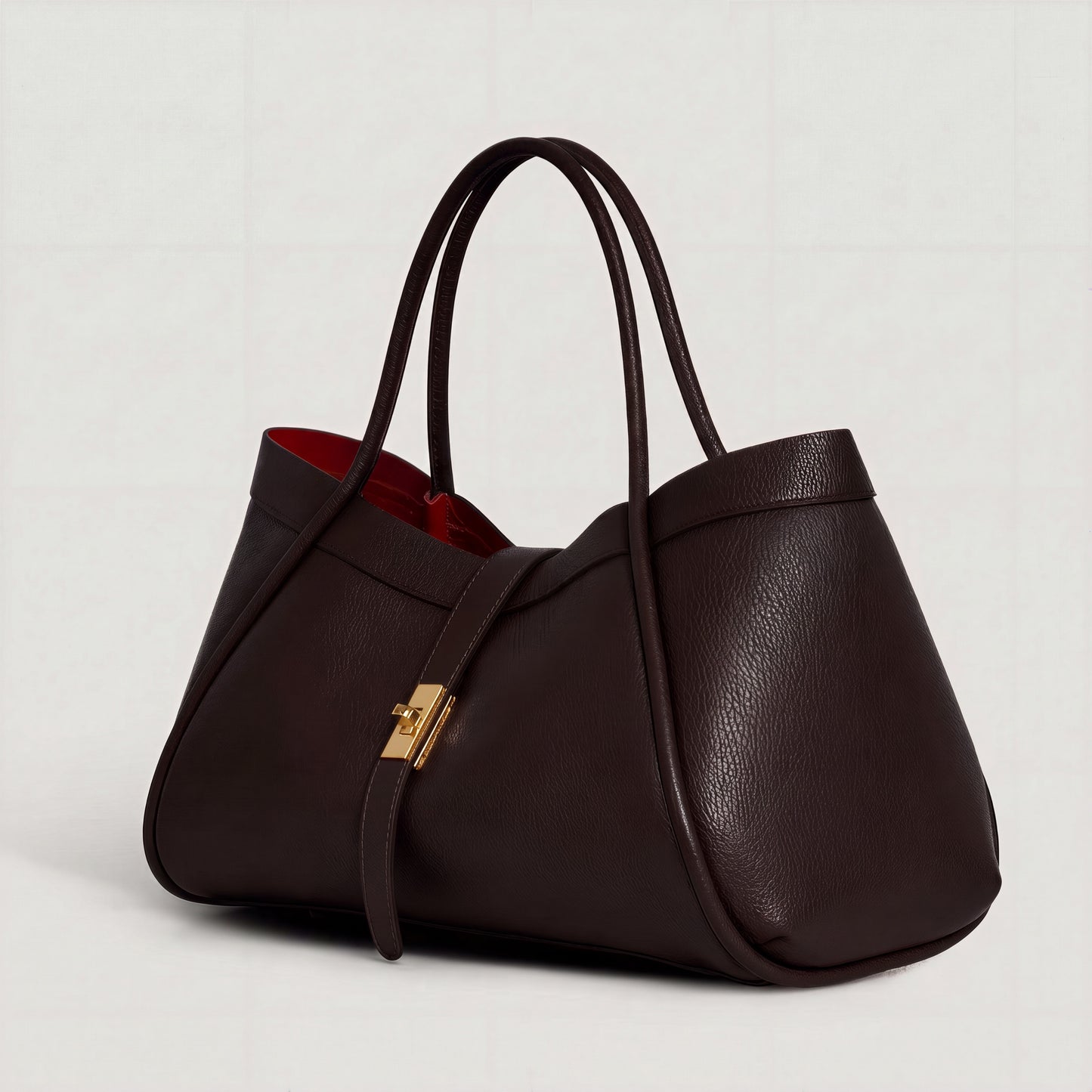 Bianca Large Leather Handbag by Clemés in Dark Chocolate, three-quarter studio shot on grey background