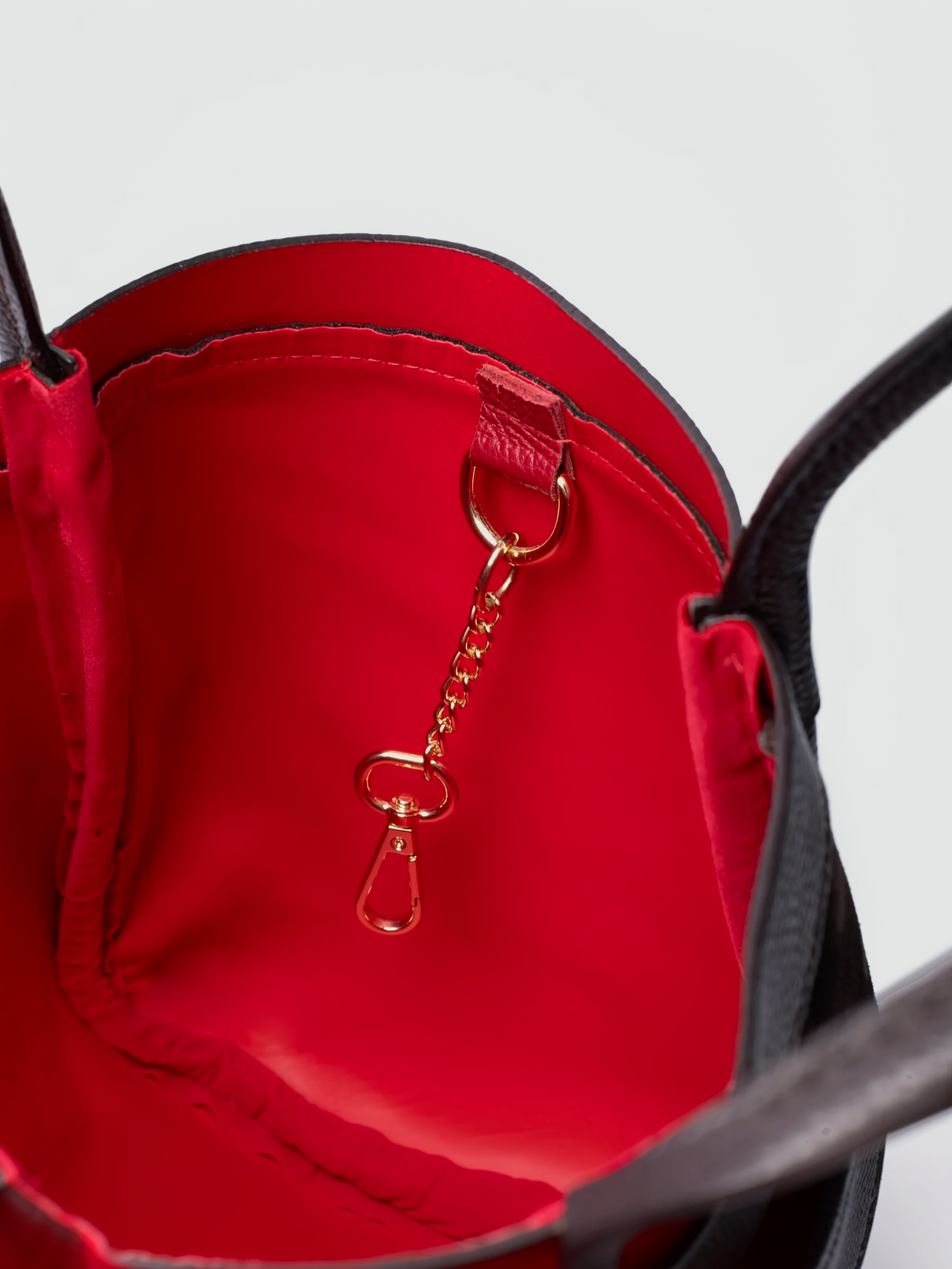 Bianca Large Suede Handbag by Clemés in Dark Brown, close-up of the interior key clip