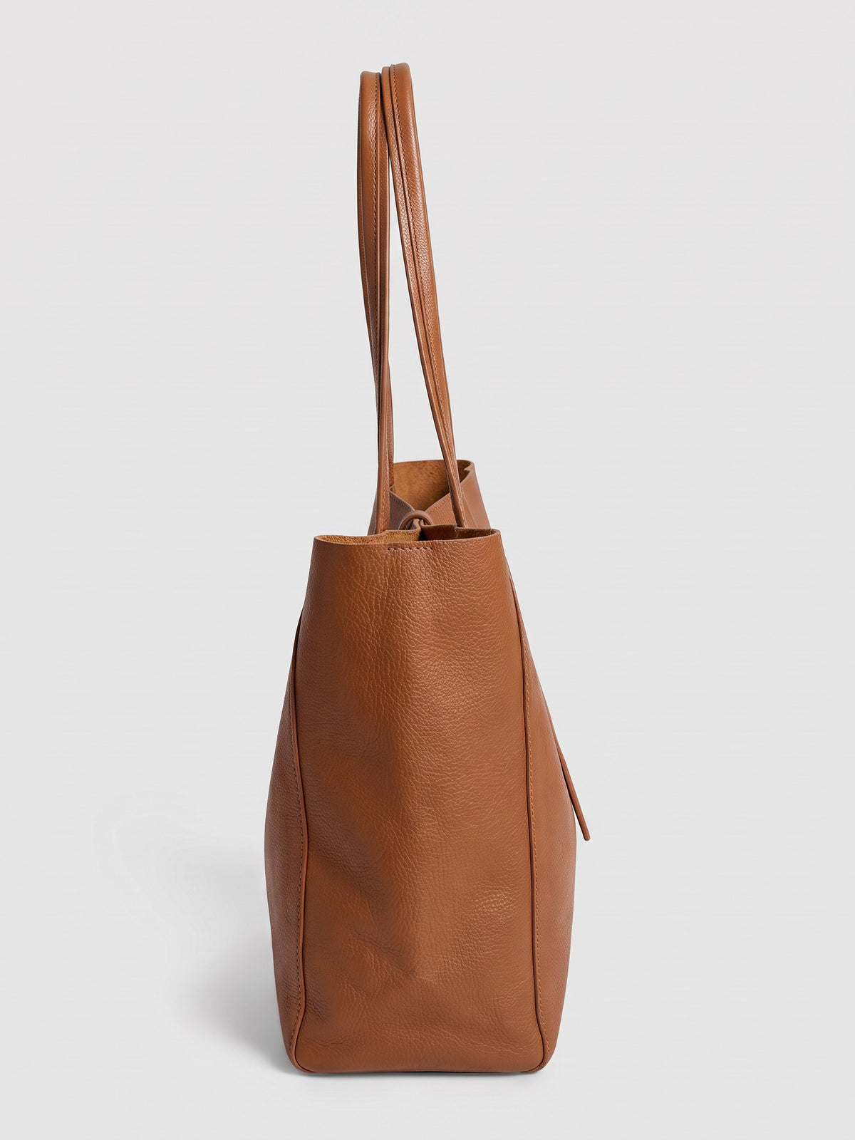 Carlotta oversized leather tote by Clemés in Dark Tan leather, side profile view