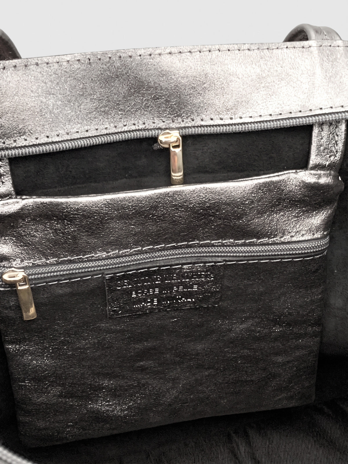 Carlotta oversized leather tote by Clemés in Titanium metallic leather, inside zip pocket and top zip detail