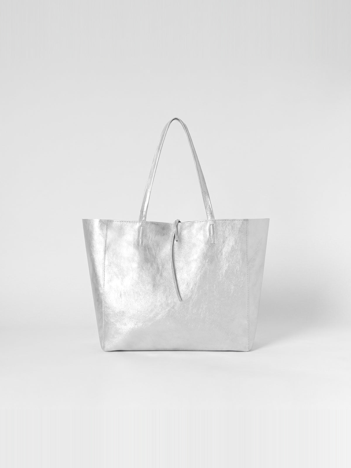 Carlotta oversized leather tote by Clemés in Silver metallic leather, straight front studio view