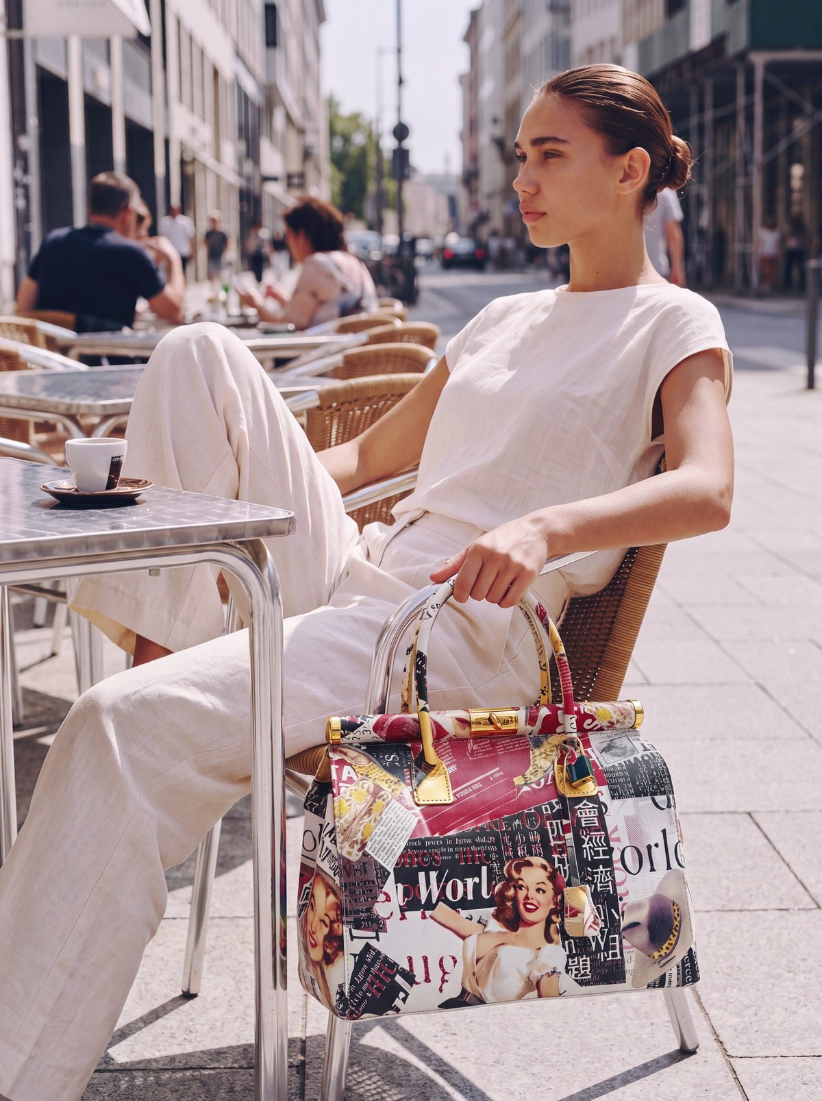 Dalia Journal leather top-handle bag - cafe lifestyle