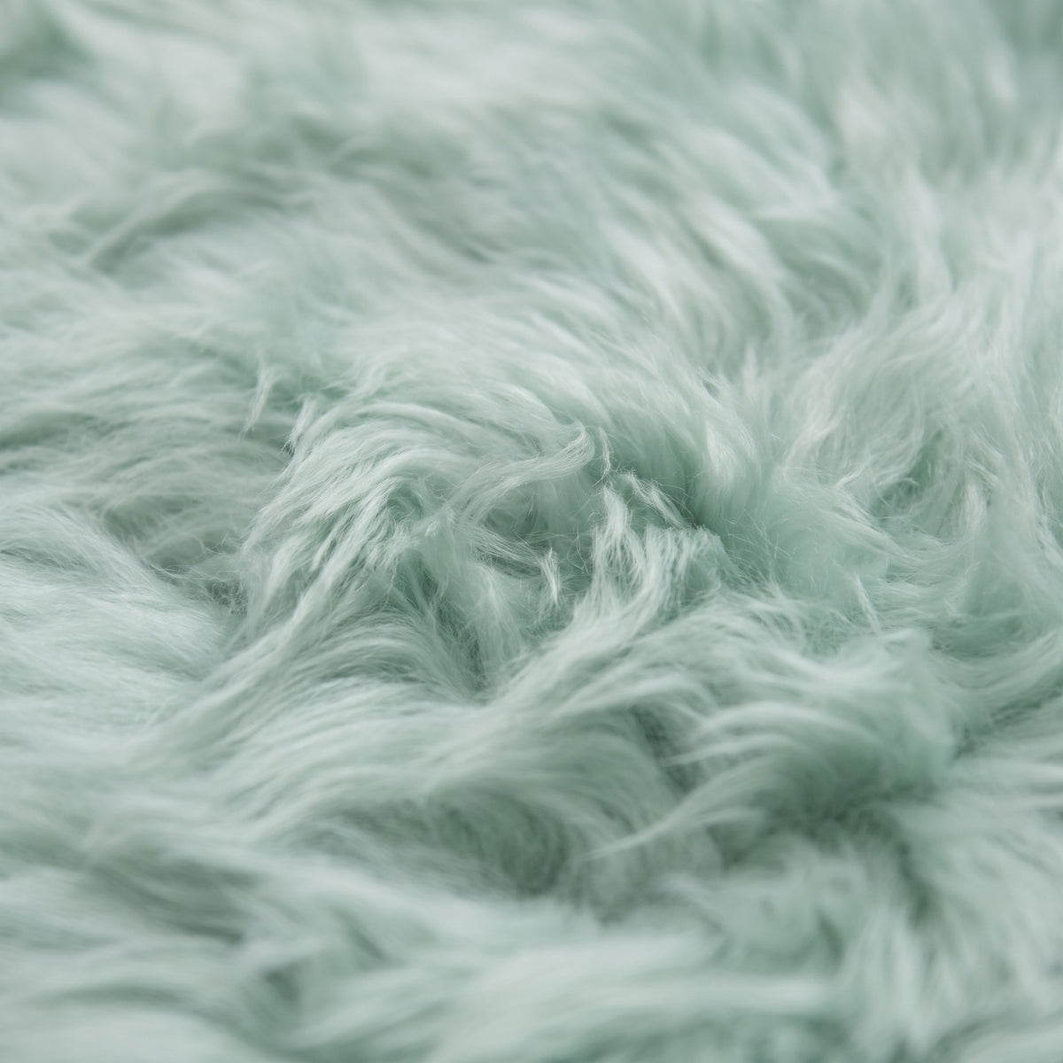 Close-up of the soft Sage coloured New Zealand sheepskin wool