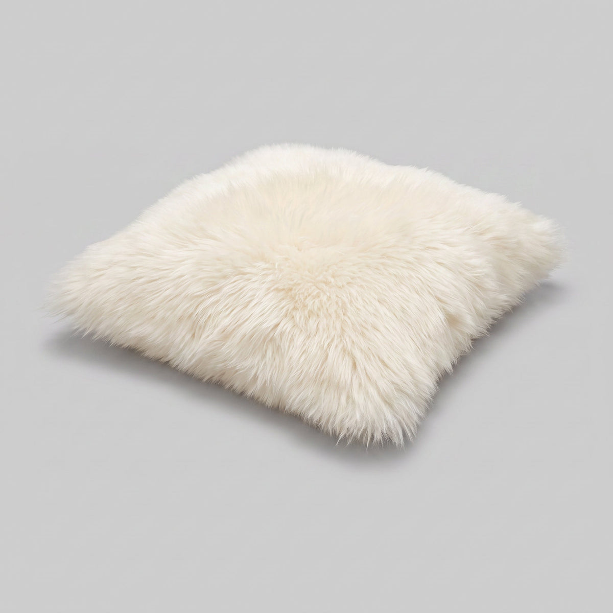 Pair of double-sided Ivory New Zealand sheepskin cushion covers 35 x 35 cm