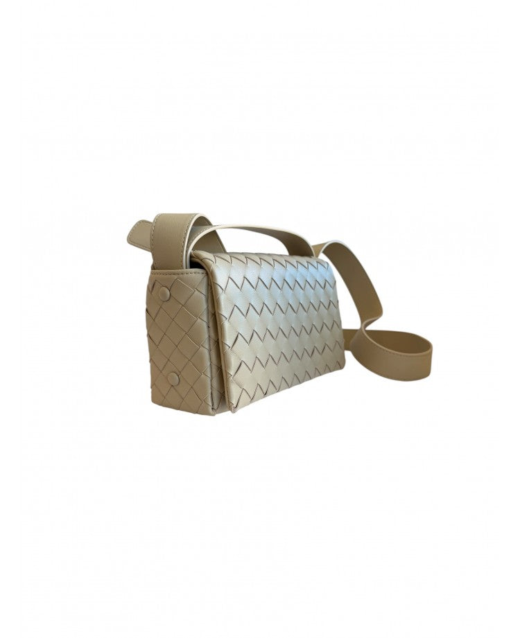 Elettra woven leather crossbody bag in Beige at an angle, showing the depth and press-stud side gussets