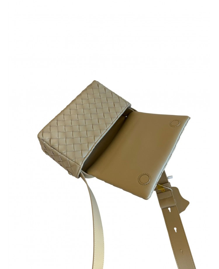 Elettra woven leather crossbody bag in Beige shown open, with the flap lifted to reveal the lined interior