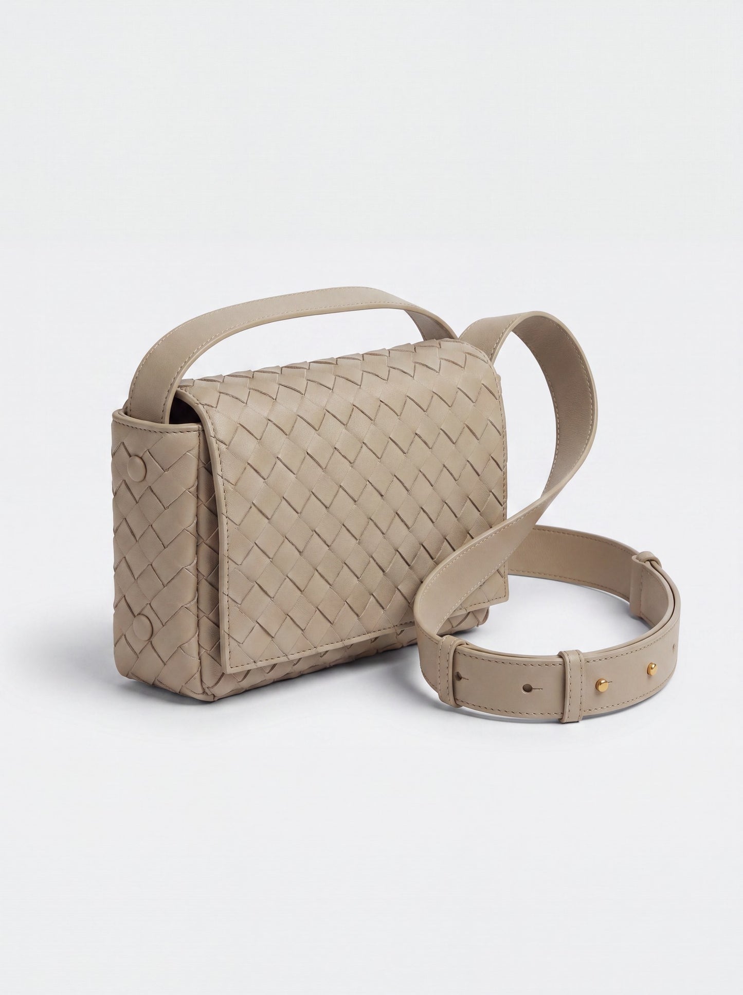 Elettra woven leather crossbody bag by Clemés in Beige, studio three-quarter view