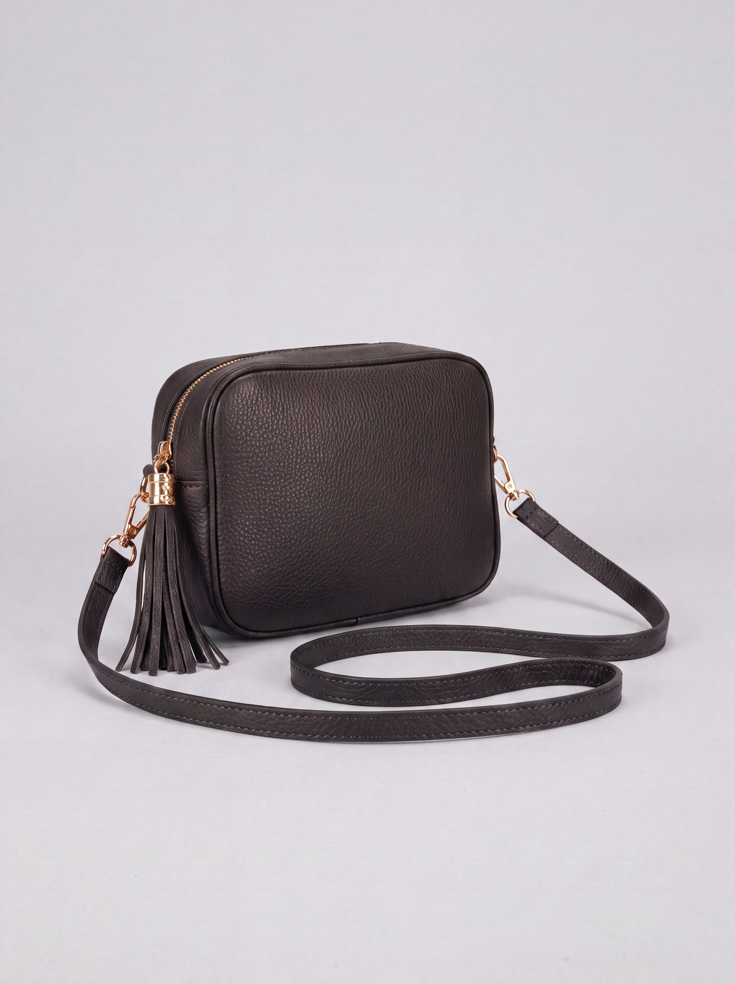 Éloise Leather Tassel Camera Bag by Clemés in Black — studio product photo