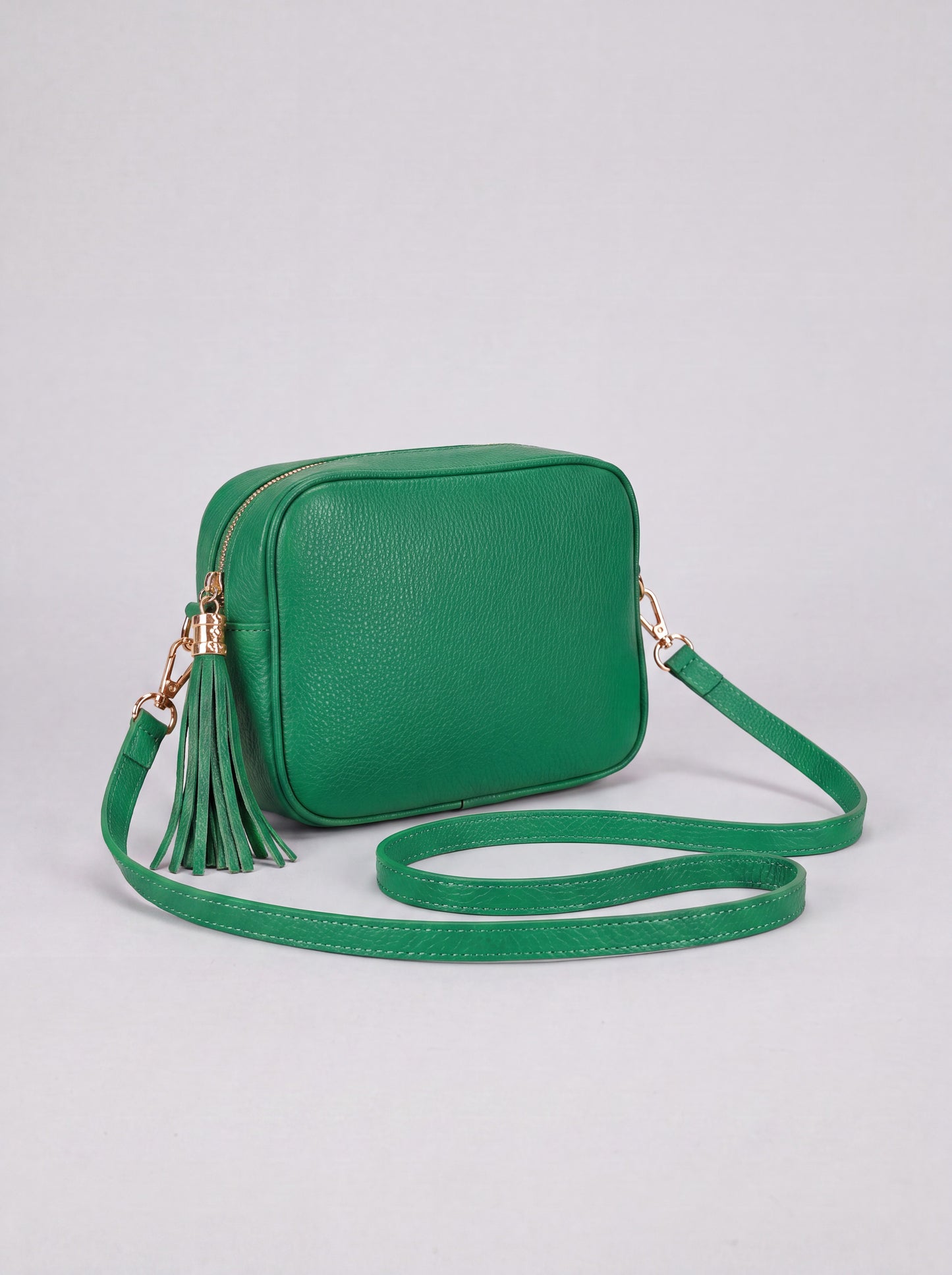 Éloise Leather Tassel Camera Bag by Clemés in Green — studio product photo