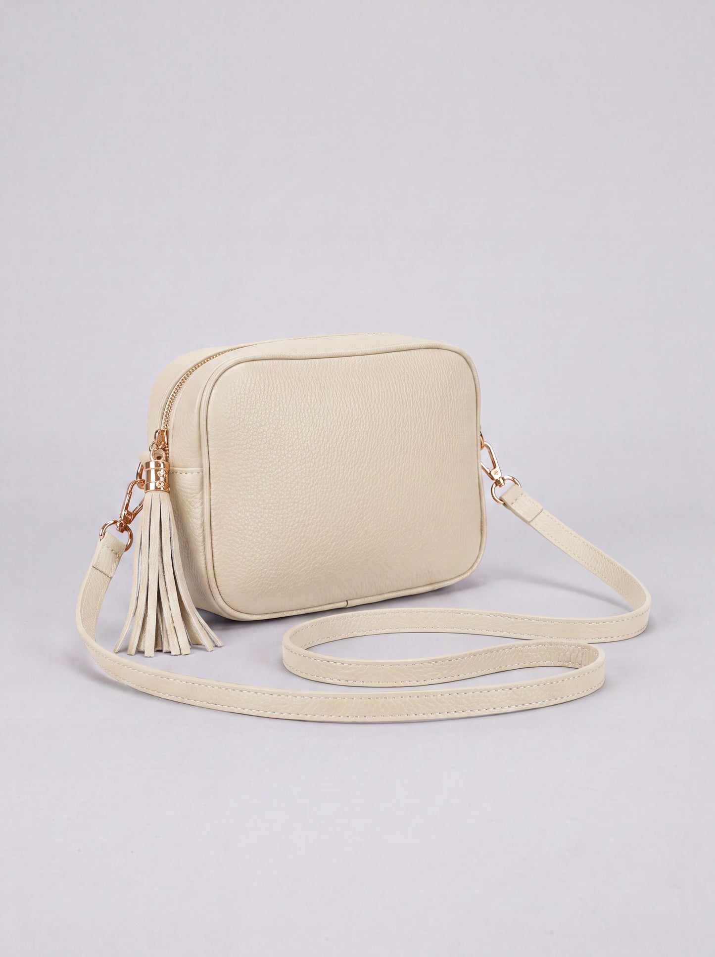 Éloise Leather Tassel Camera Bag by Clemés in Ivory — studio product photo