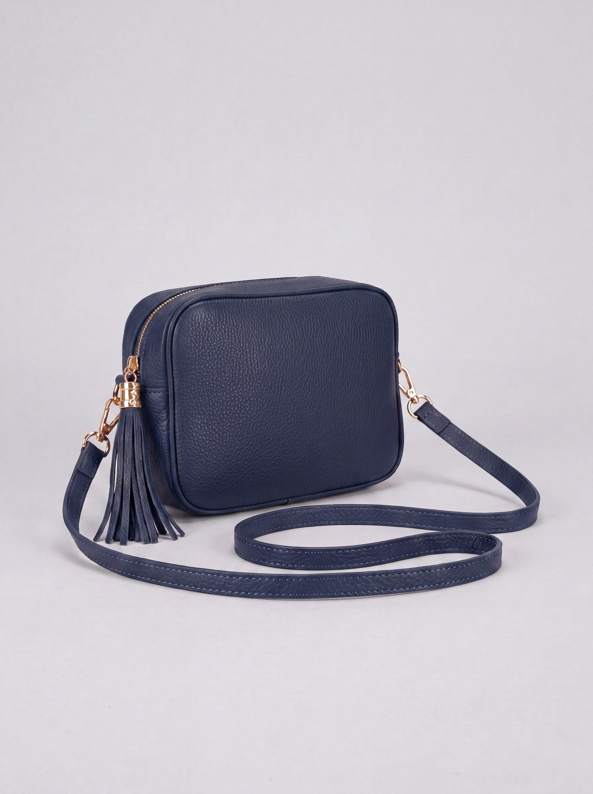 Éloise Leather Tassel Camera Bag by Clemés in Navy — studio product photo