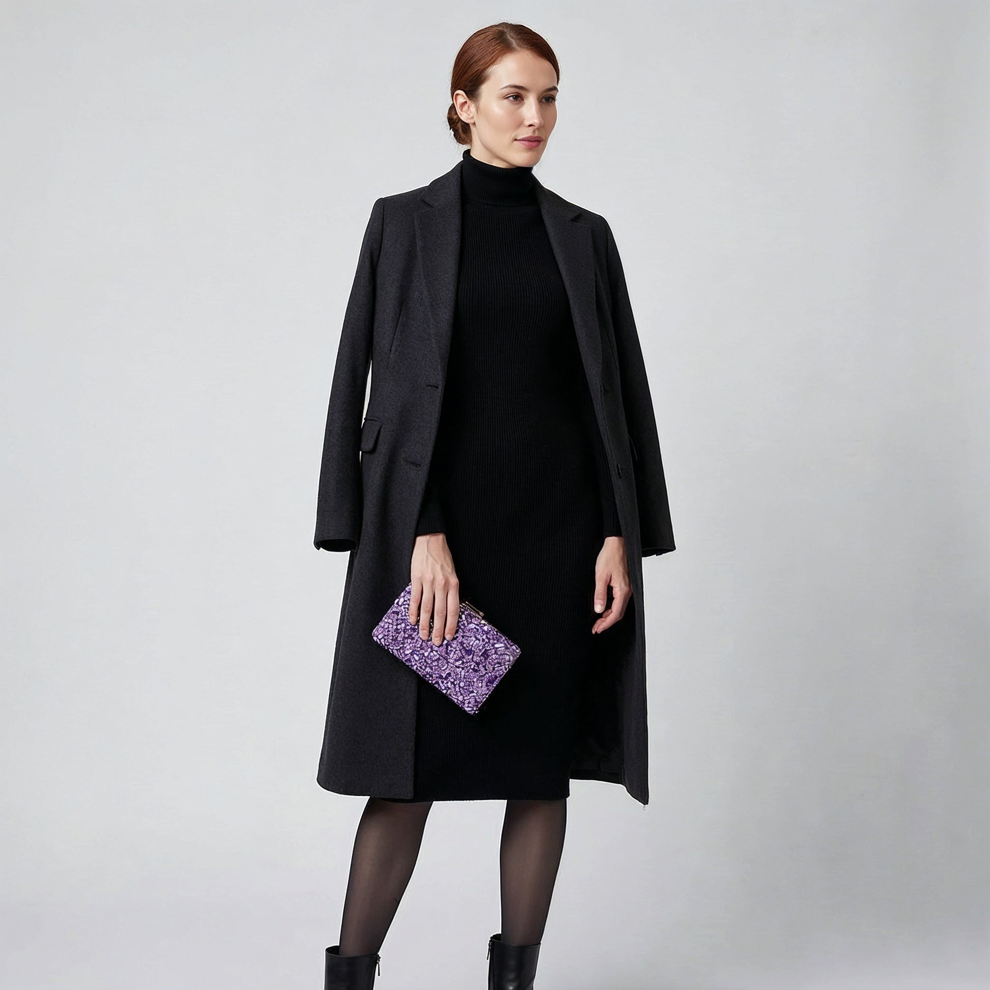 Model with the Violet Gemma Natural Stone Box Clutch tucked under her arm, studio shot