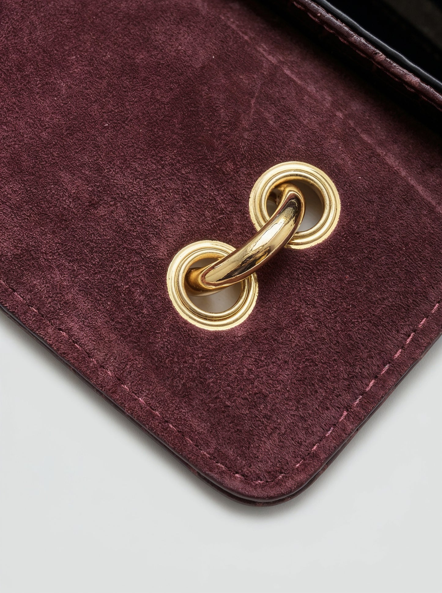 Clotilde Bamboo Croc Handbag by Clemés - Burgundy - close-up of gold ring hardware on suede interior flap