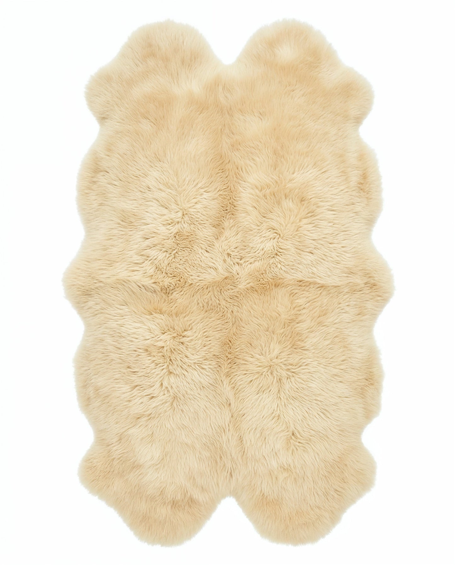 Champagne quad sheepskin rug flat lay on white background
