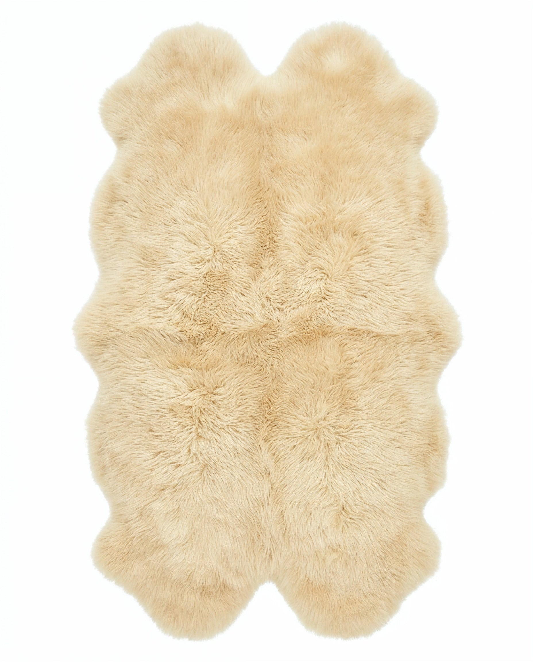 Champagne quad sheepskin rug flat lay on white background