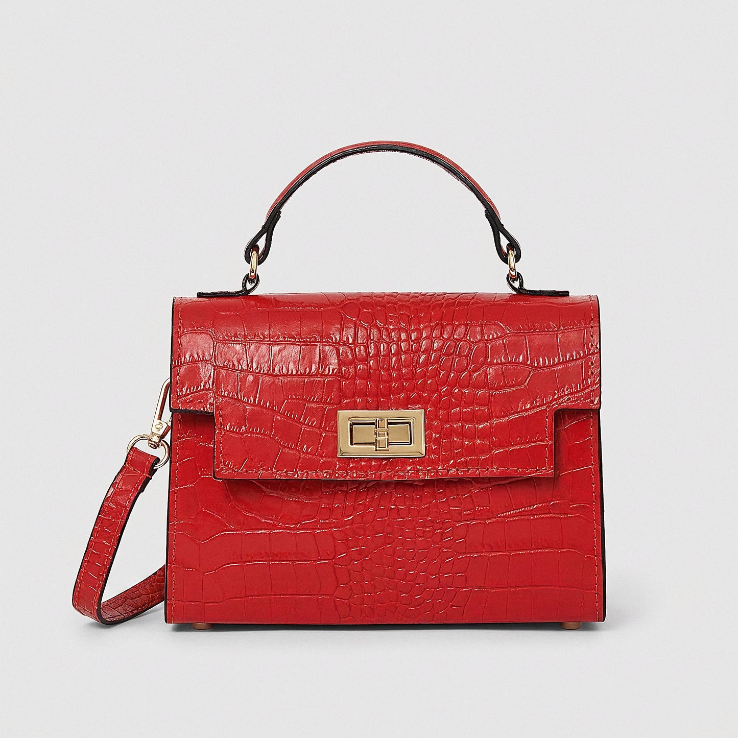 Red Margot Croc crossbody bag, studio product photo on grey background