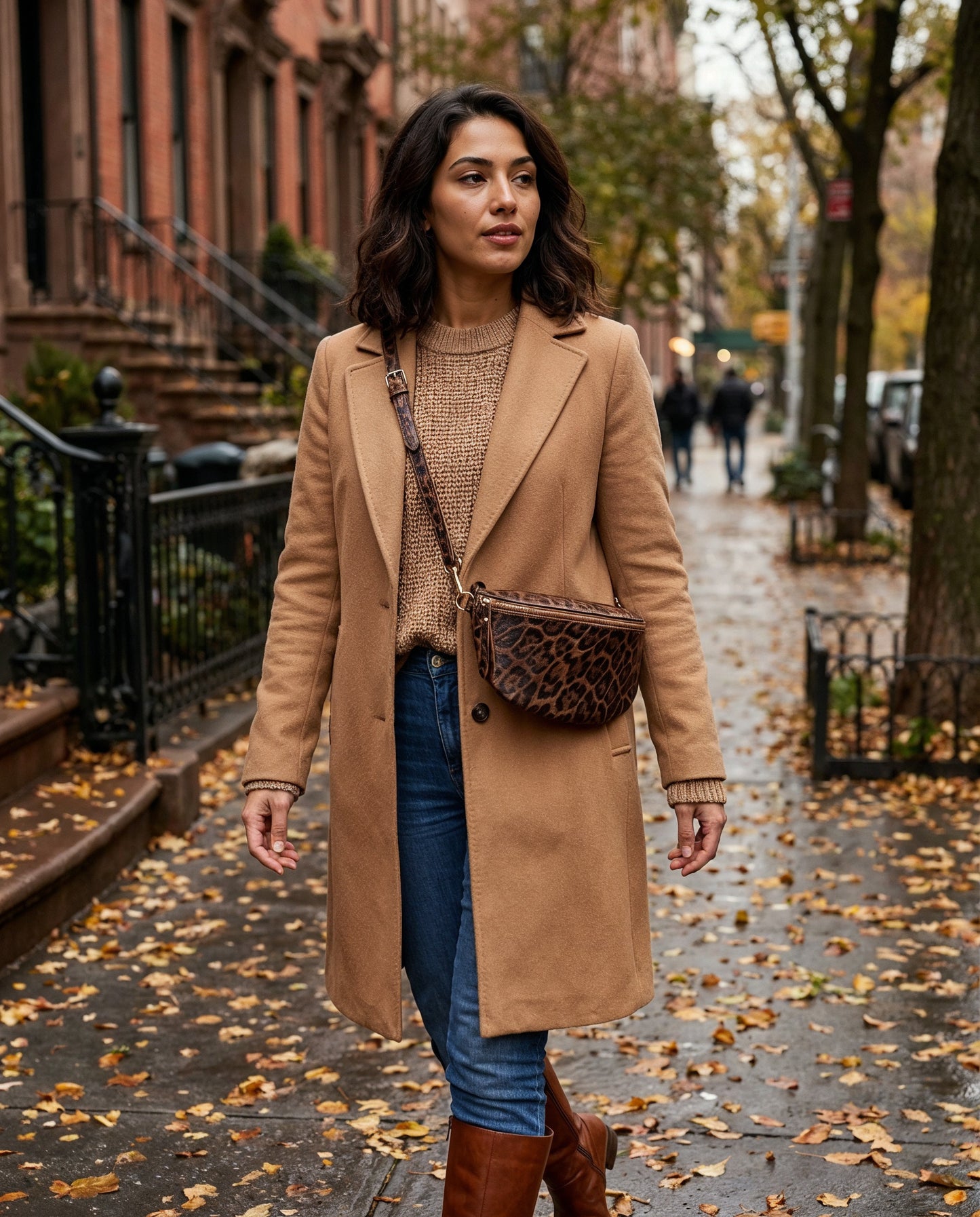 Model with the Dark Tan Leopard Romy bum bag on an autumn city street