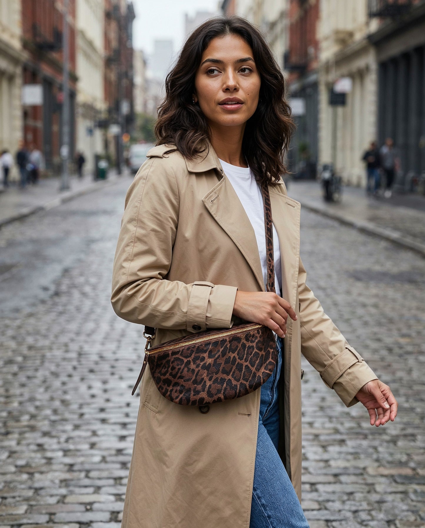 Woman with the Dark Tan Leopard Romy bum bag on an overcast city street