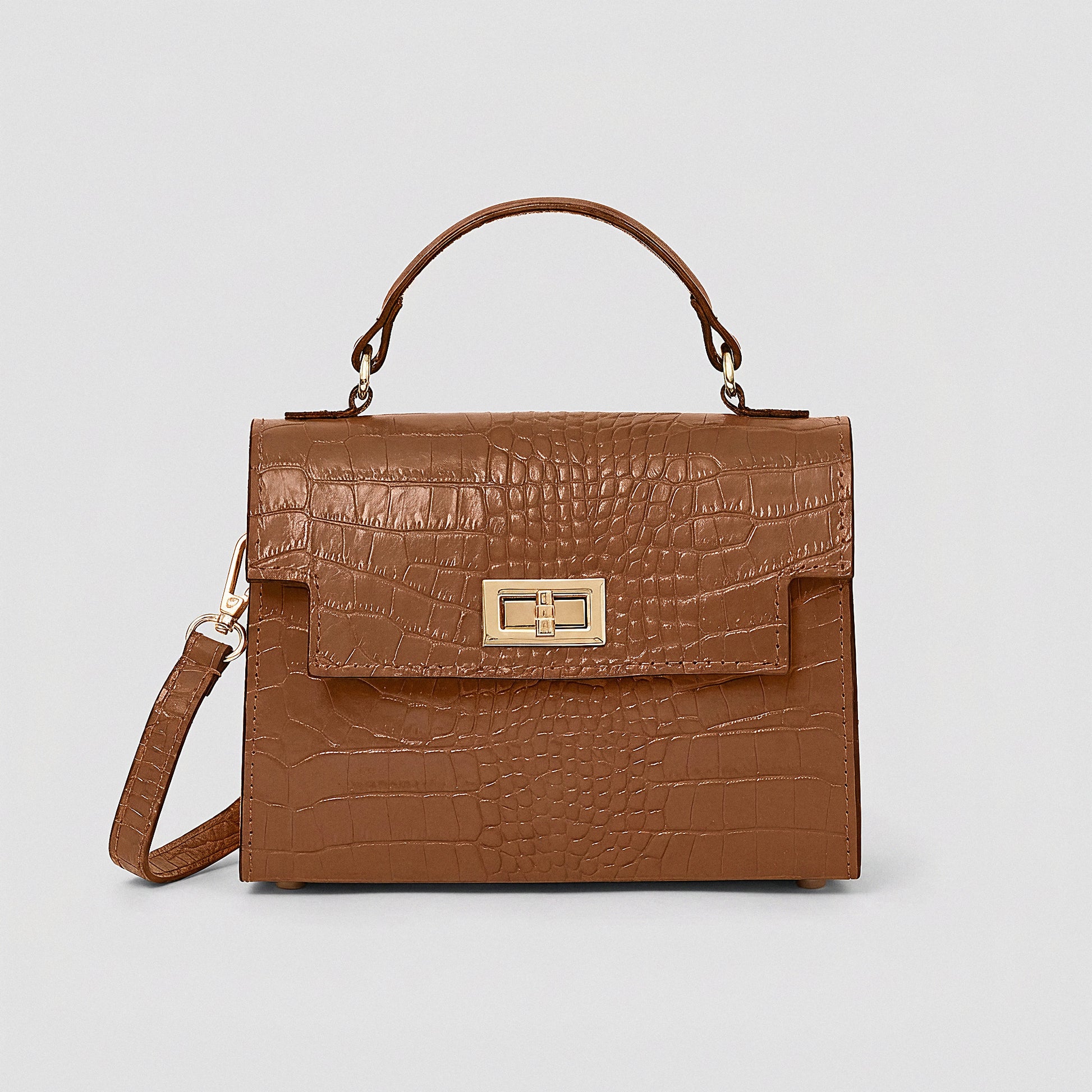Tan Margot Croc crossbody bag, studio product photo on grey background