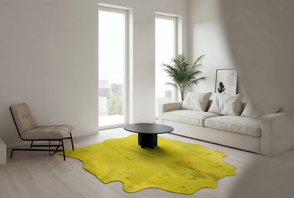 Acid wash yellow cowhide rug, side angle, in a minimalist living room