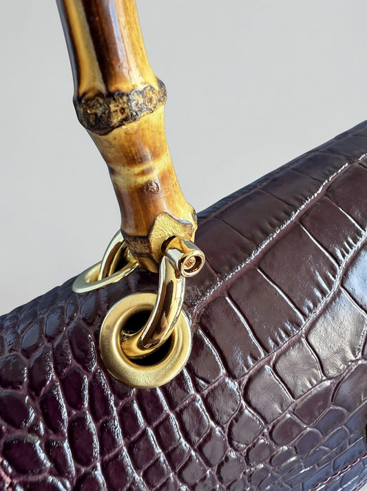 Clotilde Bamboo Croc Handbag by Clemés - Burgundy - close-up of bamboo handle and gold ring hardware