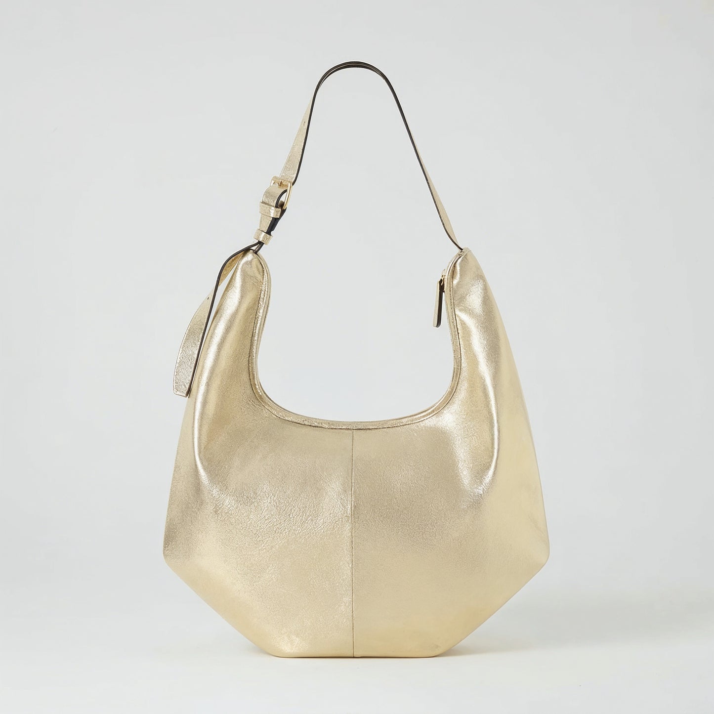 Ludovica leather hobo shoulder bag in champagne on a light grey studio background
