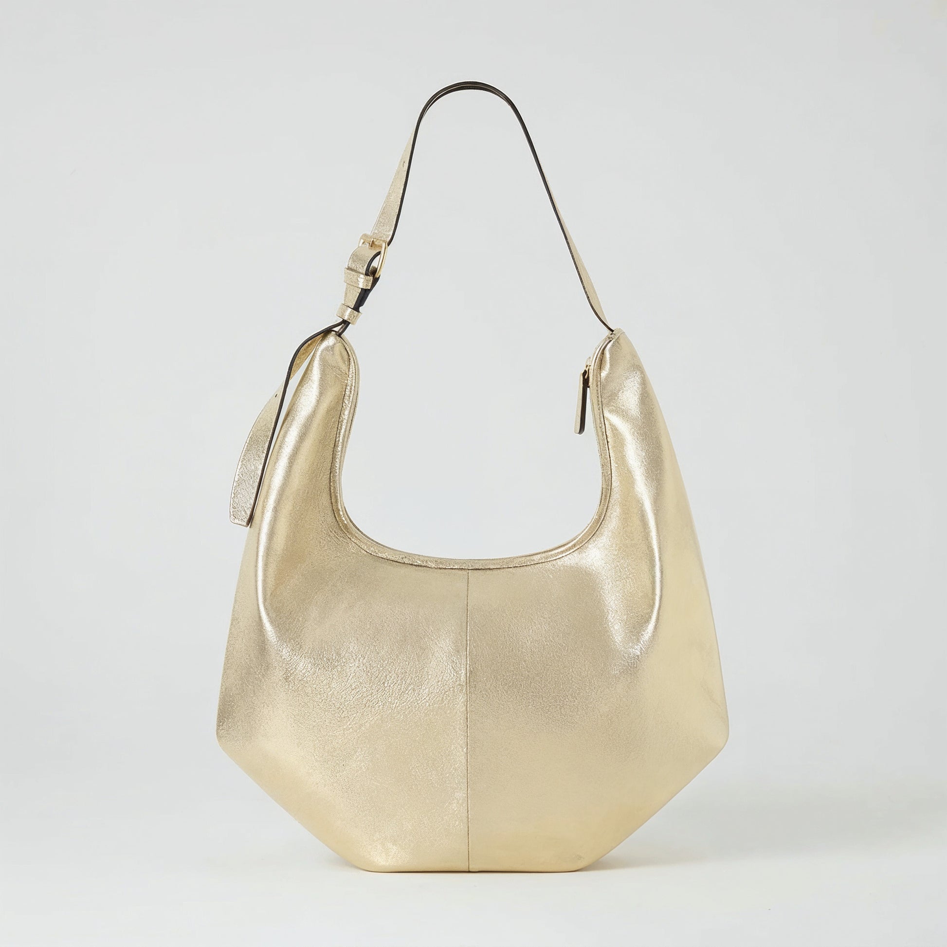 Ludovica leather hobo shoulder bag in champagne on a light grey studio background