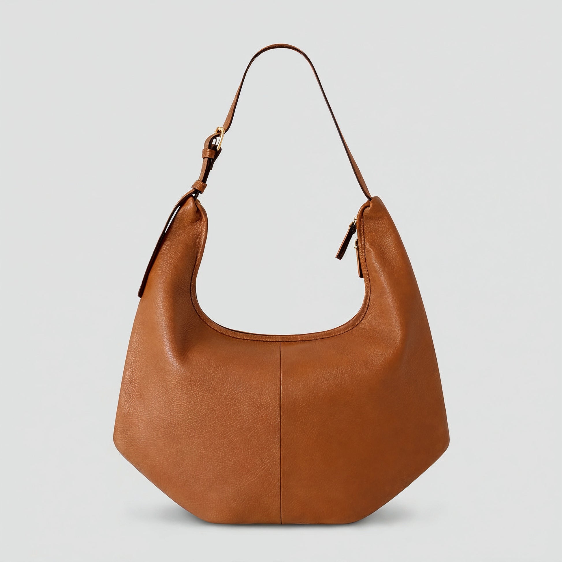 Ludovica leather hobo shoulder bag in tan on a light grey studio background
