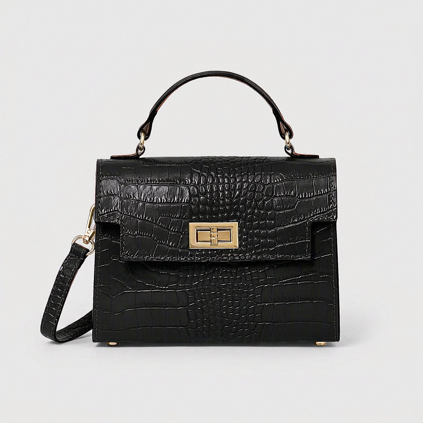 Black Margot Croc crossbody bag, studio product photo on grey background